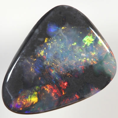SOLID BLACK OPAL Sparkling bright fire bordered by black opal